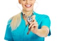 Smile female doctor or nurse uses stethoscope