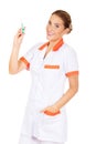 Smile female nurse or doctor with a syringe in hand Royalty Free Stock Photo