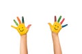 Smile, happiness and fun concept. Happy kid shows painted hands