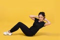 Smile happy Beautiful portrait young Asian woman stretching exercise workout on yellow background, fitness sport girl aerobic and Royalty Free Stock Photo