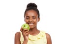 Smile, health and portrait of girl and apple in studio for nutrition, wellness and diet. Food, self care and vitamin c