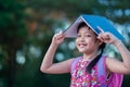 Smile little school girl holdind a book  with backpack.Back to school concept Royalty Free Stock Photo