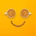 Smile look made from two cups of coffee and coffee beans on yellow background Royalty Free Stock Photo