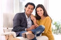 Smile, love and couple on chair in living room at home with comfortable romance and care. Happy, marriage and portrait Royalty Free Stock Photo