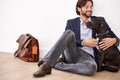 Smile, love and happy businessman with dog for bonding together with positive and good attitude. Career, briefcase and Royalty Free Stock Photo