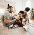 Smile, love and an interracial family on the floor, playing in the living room of a home together for bonding. Mother Royalty Free Stock Photo