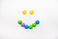 A smile made from children`s toys. Multicolored figures for games