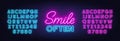 Smile Often neon lettering on brick wall background