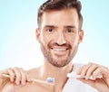 Smile, portrait or happy man brushing teeth with dental toothpaste for healthy oral hygiene grooming in studio. Eco Royalty Free Stock Photo