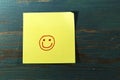 Smile post it on wood