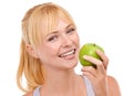 Smile, studio and portrait of woman with apple for vegan, diet and nutrition benefits for wellness. Food, face and happy Royalty Free Stock Photo