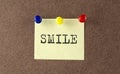 SMILE text written on Message Board. Memo Royalty Free Stock Photo