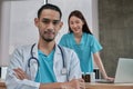 Smile uniform two young doctors team with stethoscope in clinic Royalty Free Stock Photo