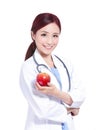 Smile woman doctor hold apple Royalty Free Stock Photo