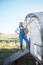 Smile, woman and eggs in basket on farm with chicken, grass and sunshine in countryside field for sustainable business Royalty Free Stock Photo