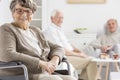 Smiled woman on a wheelchair Royalty Free Stock Photo