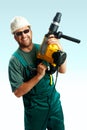 Smiled workman hold perforator Royalty Free Stock Photo