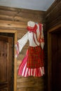 Smilen, Bulgaria - Indoor interior of old bulgarian house, ethnography, traditional costumes from Bulgaria, hanged on a wall Royalty Free Stock Photo