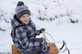 Smiles boy on sledges Royalty Free Stock Photo