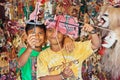 Smiley Balinese children play with shadow puppets