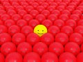 A smiley ball in angry  balls team. Royalty Free Stock Photo