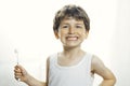 Smiley boy with toothbrush Royalty Free Stock Photo