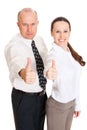 Smiley business people showing thumbs up Royalty Free Stock Photo