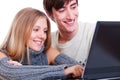 Smiley couple with laptop