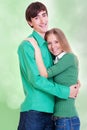 Smiley couple over green