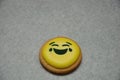 A smiley emoji biscuit Royalty Free Stock Photo