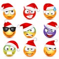 Smiley,emoticon set. Yellow face with emotions and Christmas hat. New Year Santa.Winter emoji. Sad happy angry faces Royalty Free Stock Photo