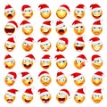 Smiley emoticon set. Yellow face with emotions and Christmas hat. New Year Santa.Winter emoji. Sad,happy,angry faces Royalty Free Stock Photo