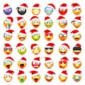 Smiley emoticon set. Yellow face with emotions and Christmas hat. New Year Santa.Winter emoji. Sad,happy,angry faces Royalty Free Stock Photo