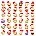 Smiley emoticon set. Yellow face with emotions and Christmas hat. New Year Santa.Winter emoji. Sad,happy,angry faces Royalty Free Stock Photo