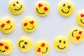 Smiley face emoticon merengue cookies with copy space in the middle. Royalty Free Stock Photo