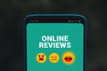 Smiley face, like, bed emoticon on smart phone with on virtual touch screen. Customer service evaluation concept. Service rating, Royalty Free Stock Photo