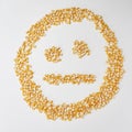 Smiley face made of corn seeds on a white background, emotion neutral
