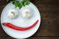 Smiley face made from pepper, garlic and parsley Royalty Free Stock Photo