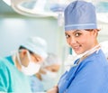 Smiley female doctor in operation room Royalty Free Stock Photo