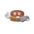 Smiley gamer chocolate macaron cartoon mascot style