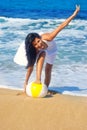 Smiley girl on the beach Royalty Free Stock Photo