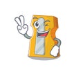 Smiley mascot of pencil sharpener cartoon Character with two fingers Royalty Free Stock Photo