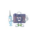 Smiley Nurse retro camera cartoon character with a syringe Royalty Free Stock Photo