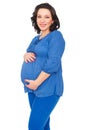 Smiley pregnant woman holding her tummy Royalty Free Stock Photo