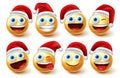 Smiley santa characters vector set. Santa claus christmas emoji character in facial expression and red hat isolated in white. Royalty Free Stock Photo