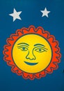 Smiley Sun Graphic on Blue background Royalty Free Stock Photo