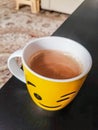 A smiley teacup early in the morning