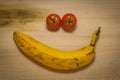 Smiley from tomatoes and banana Royalty Free Stock Photo