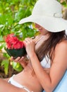 Smiley woman in bikini with tropical cocktail Royalty Free Stock Photo