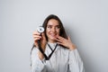 Smiley woman doctor surgeon with stethoscope on white background. Professional medecine. advert for medical clinic. Royalty Free Stock Photo